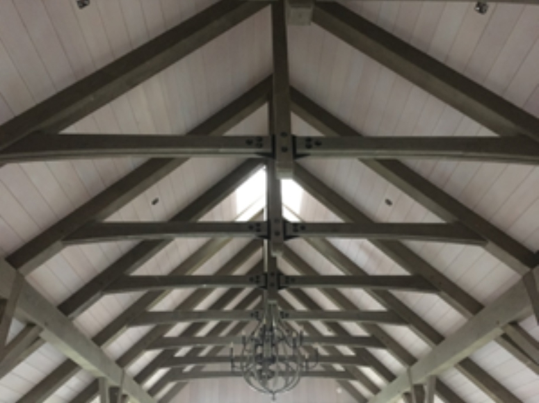 Douglas fir timbers with a heavy wire brush and custom grey-beige finish.