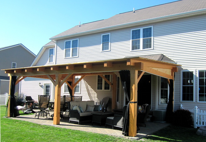 Post and beam timber construction often works best when space doesn’t allow for full trusses.