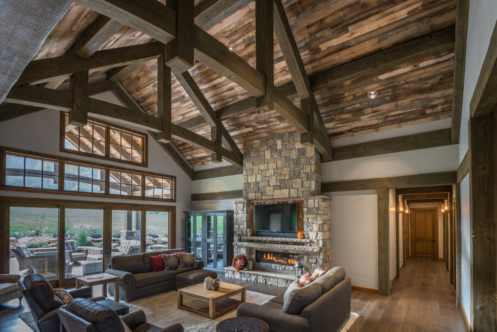 Douglas fir timbers with a multi-step finish deepened the surface of the timbers to create a rich patina reminiscent of aged and well-loved structures in the Allegheny Forest where this home is located. Photo: Scott Hemenway