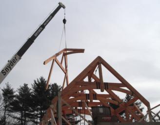 timber_frame_metal_strap_raising.jpg