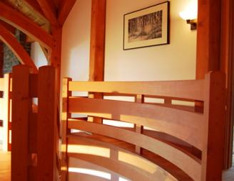 curving_stair_in_timber_frame_by_woodworks.jpg