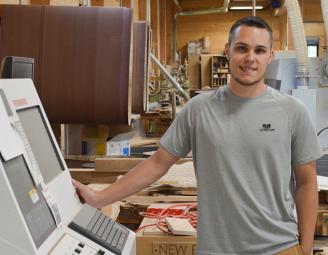 josh_at_cnc_in_newwoodworks_pod.jpg