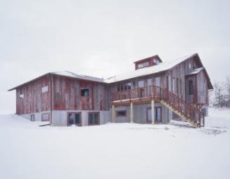reclaimed_red_barn_siding_on_home.jpg
