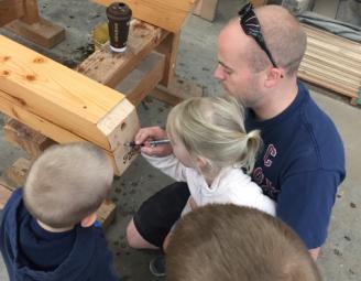 signing_a_timber_for_timber_frame_family_pic.jpg