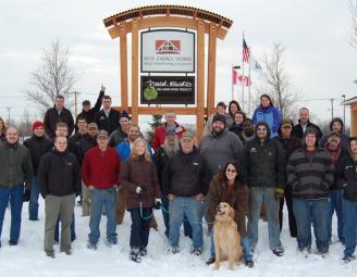 group_in_front_of_sign.jpg