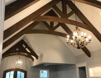 custom_stained_crank_up_trusses_in_living_room.jpg