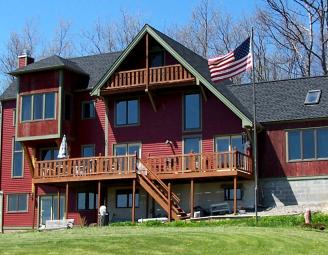 red_timberframe_with_flag.jpg