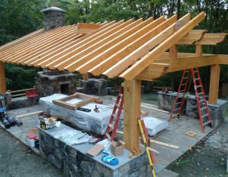 outdoor_timber_pavilion_raising_w_fireplace.jpg