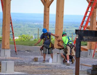 guys_putting_timber_bent_in_place.jpg