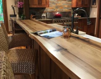live_edge_hickory_top_and_walnut_cabinetry_newwoodworks.jpg