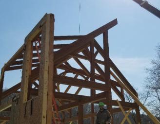 raising_wall_on_timber_frame_ny_lake.jpg