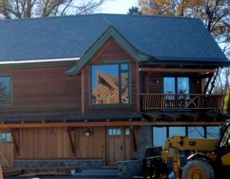 timber_frame_reflection_in_window.jpg