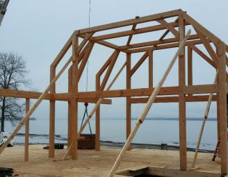 naked_timber_frame_springport_ny_lake_home.jpg