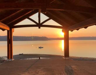 timber_truss_over_sunset_lake.jpg