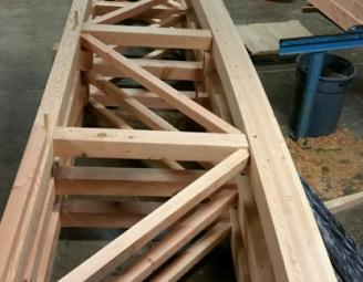 curved_parallel_chord_grocery_store_trusses.jpeg