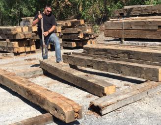 jesse_sorts_reclaimed_ag_timbers.jpg