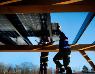 installing_solar_panel_suncommon_new_energy_works.jpg