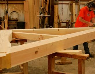 hand_sanding_joinery_on_truss.jpg