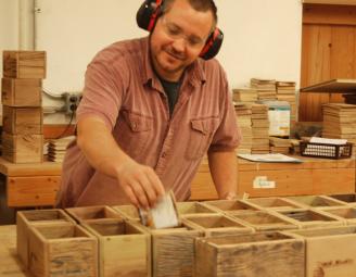 steve_w_reclaimed_wood_samples.jpg