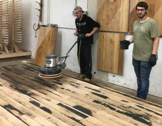 keenan_and_adam_prefinishing_reclaimed_oak_pioneer_millworks.jpg