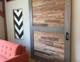 reclaimed_wood_flat_track_door_newwoodworks.jpg