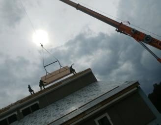 st_pius_sip_roof_panel_install.jpg