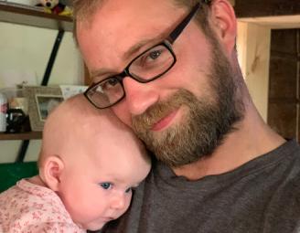 ed_with_baby_daughter.jpg