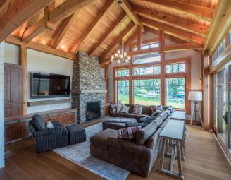 timber_frame_modest_great_room_in_lake_house.jpg