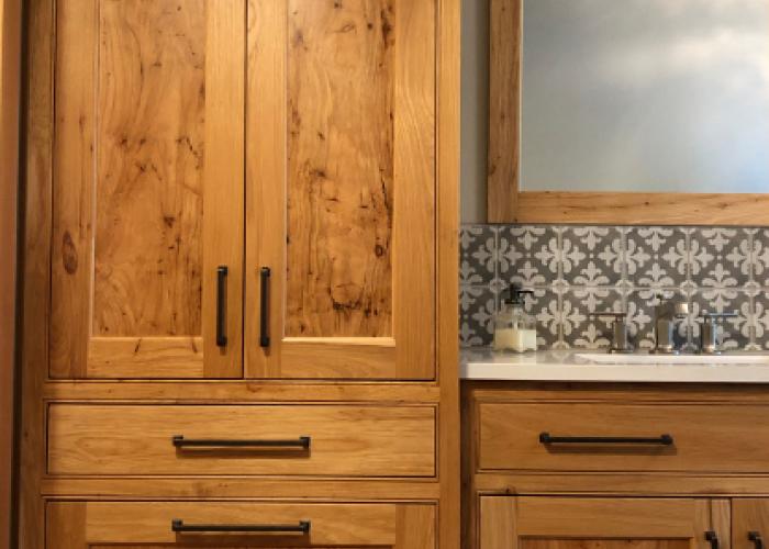 custom_hickory_vanity_and_linen_closet_newwoodworks.jpg