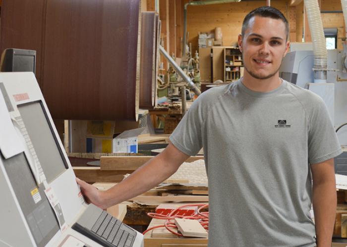 josh_at_cnc_in_newwoodworks_pod.jpg
