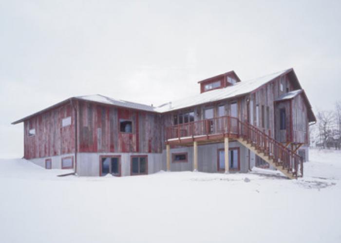 reclaimed_red_barn_siding_on_home.jpg