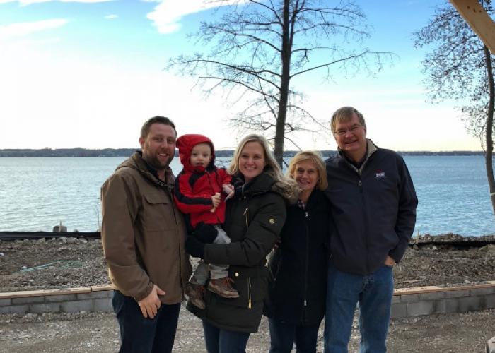 family_timber_frame_raising_on_lake.jpg