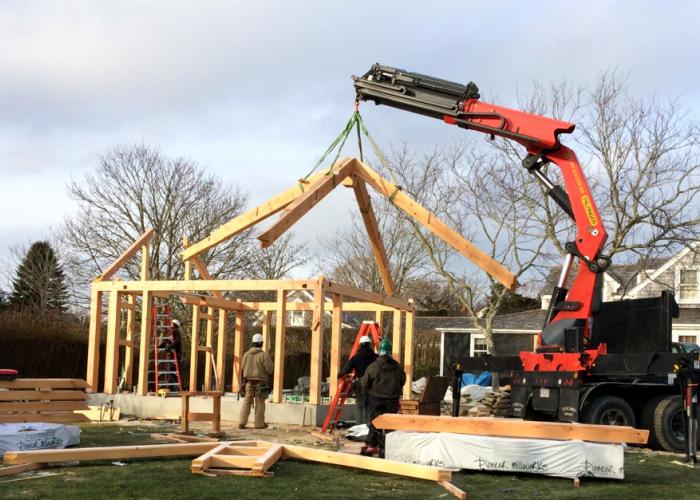 timber_frame_roof_system_raising.jpg