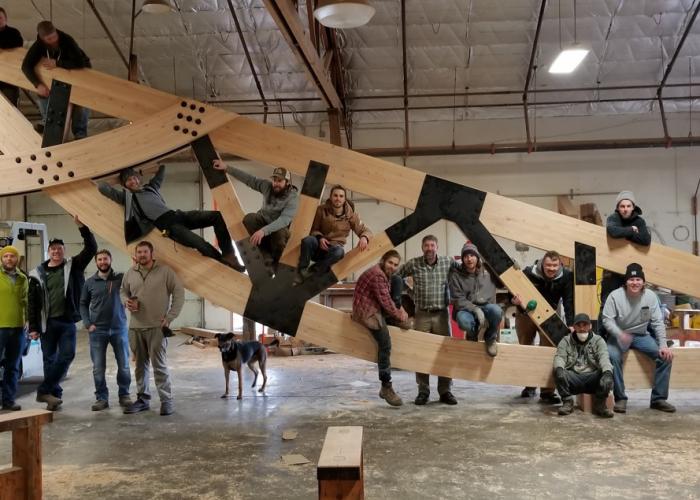 team_on_glulam_truss.jpeg