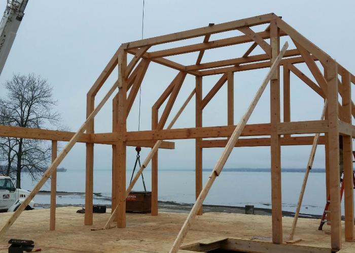 naked_timber_frame_springport_ny_lake_home.jpg