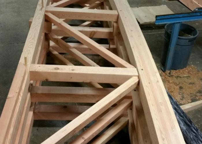 curved_parallel_chord_grocery_store_trusses.jpeg
