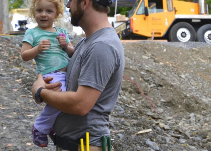 john_and_daughter_timber_raising.jpg