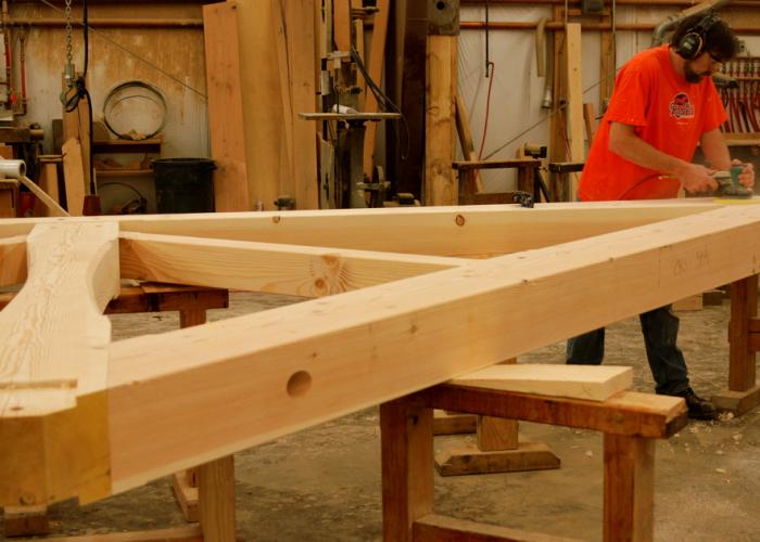 hand_sanding_joinery_on_truss.jpg