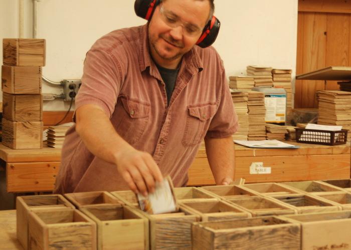 steve_w_reclaimed_wood_samples.jpg