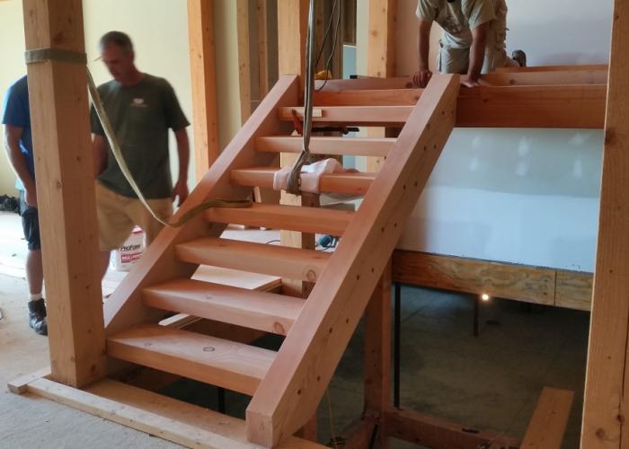 installing_timber_stair_in_frame.jpg