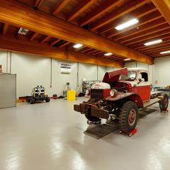 Glulam construction allows for large spans and ample space within, like with this barn for working on classic cars.