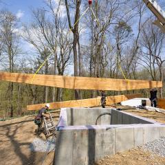 A side view of these glulam support beams shows their asymmetrical design, which is easily achieved by simply assembling differently sized layers.