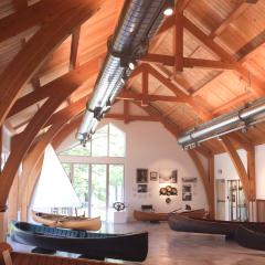 Glulam beams are easily engineered into curved braces, providing structural support that maintains an open interior space for inspiring spaces like this musem.